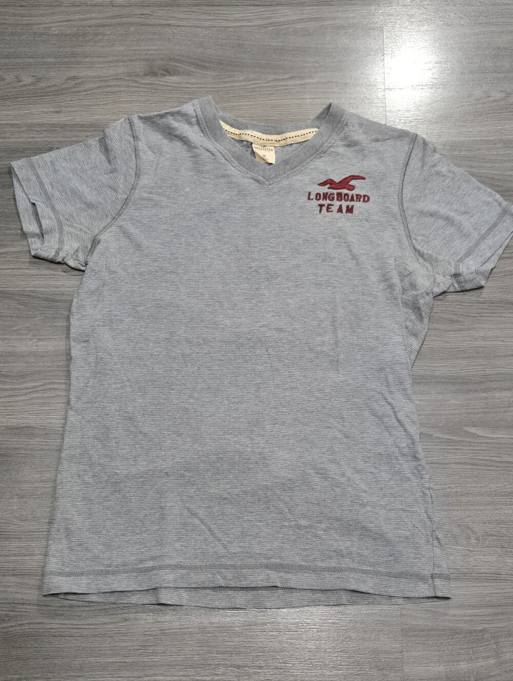 Hollister Light Gray V-Neck 'Longboard Team' Tee with Red Logo Womens Medium